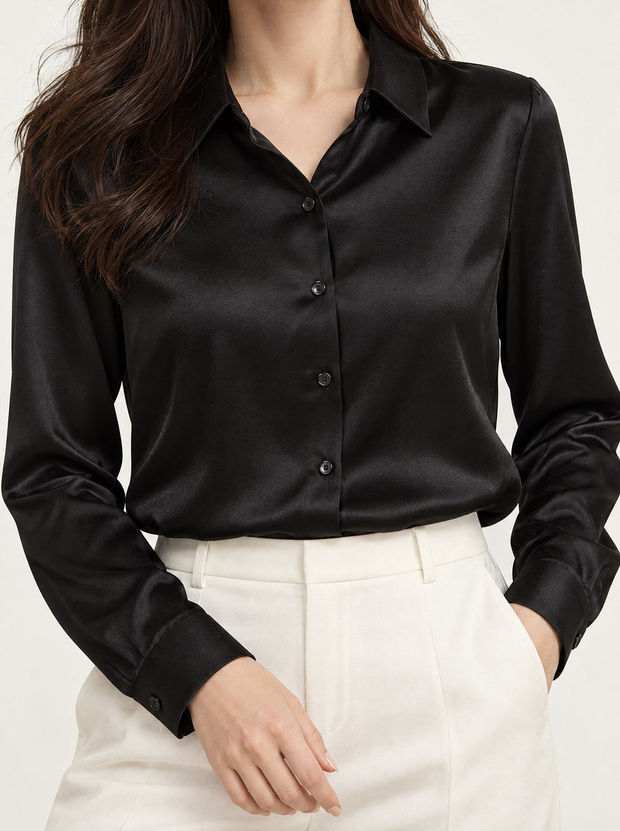 The front of the black shirt, showing the sheen of the satin