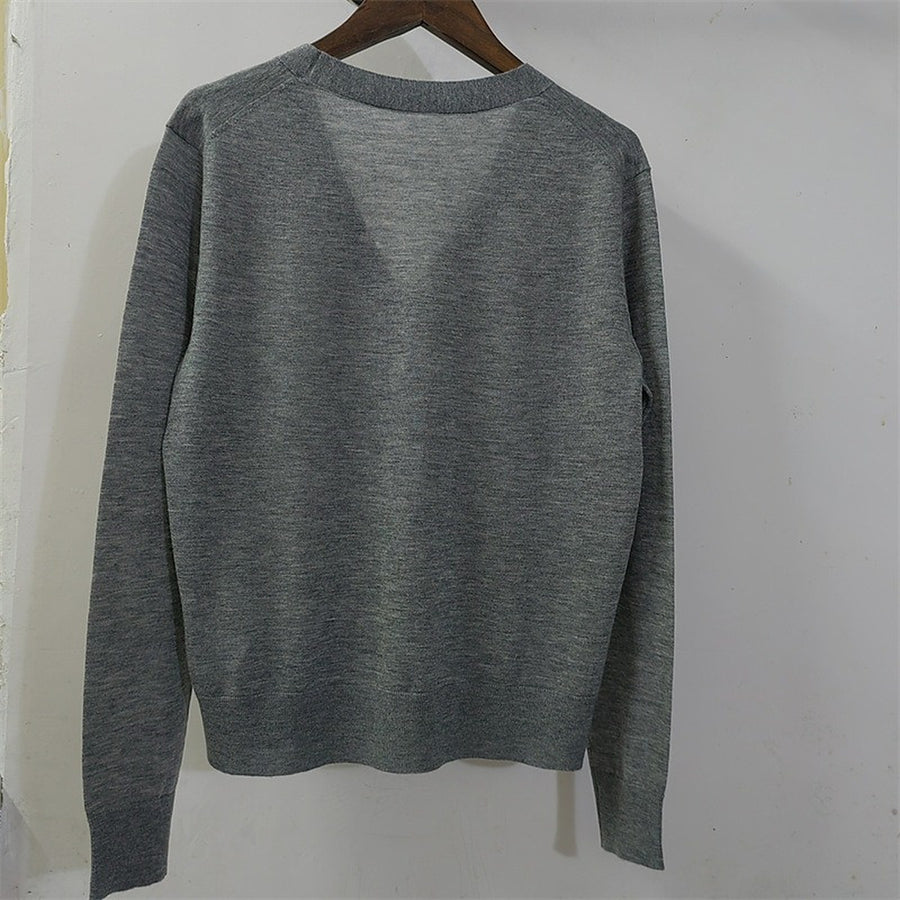 The grey cardigan on a hanger, back