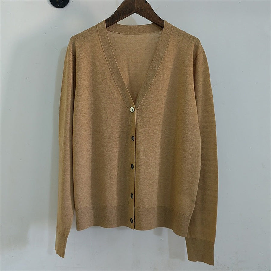 The camel cardigan on a hanger, front