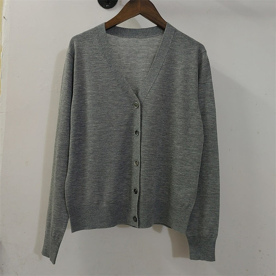 The grey cardigan on a hanger, front