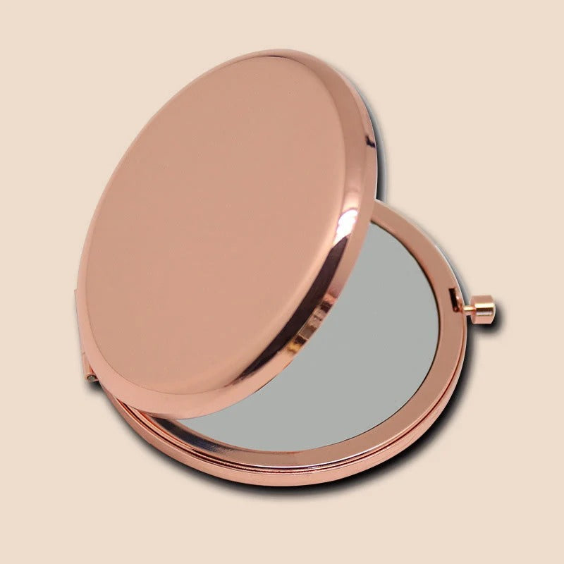 Rose gold compact mirror open