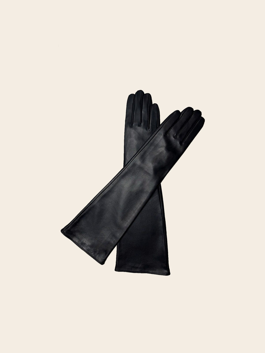 The black gloves crossed, flat