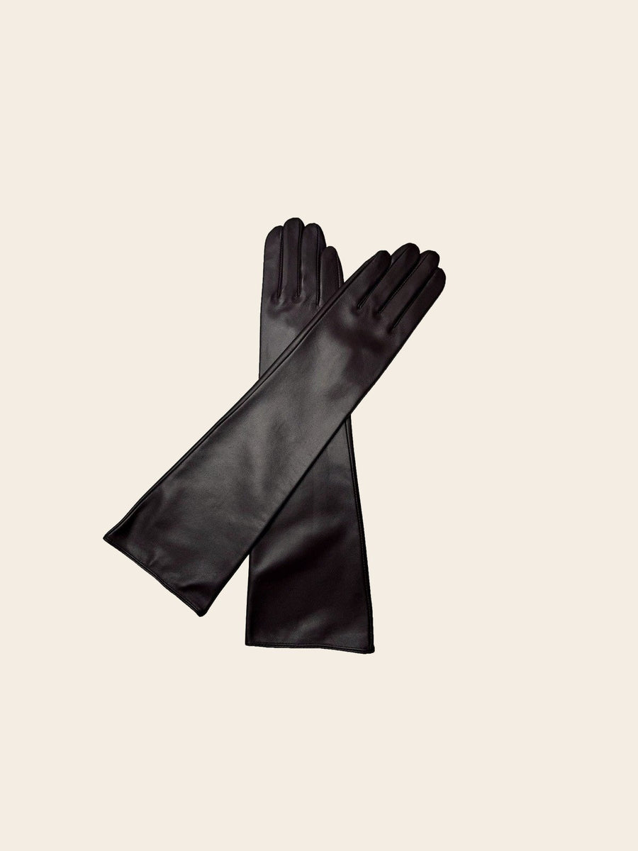 The dark chocolate gloves crossed, flat