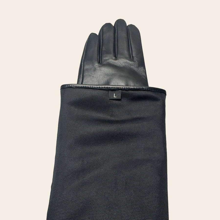 A glove turned inside out to show its dark lining