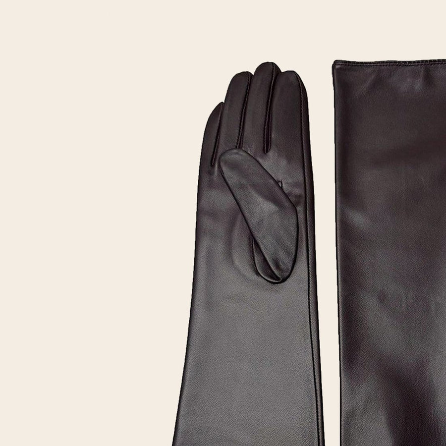 The palm side of a dark chocolate glove and its thumb